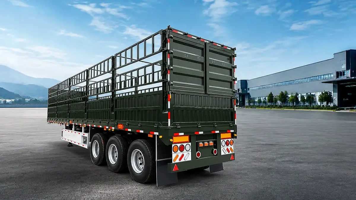 Vehicle Master 3-axle fence semi trailer loaded with construction materials on African road Vehicle Master 3-axle fence semi trailer loaded with construction materials on African road